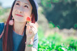 © Nitiphonphat - Happy Tourist girl enjoy picking Fresh Strawberry harvest garden in holiday . fruit harvesting strawberries field Concept.