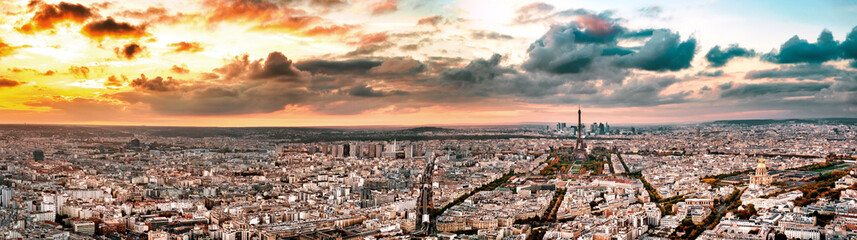 Canvas Print - Aerial Paris view in late autumn at sunset. Eiffel Tower in the distance and financial district.