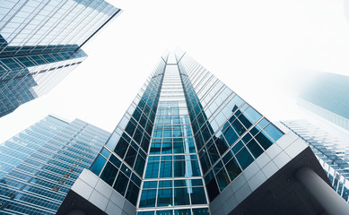 Poster - Glass facades of modern skyscrapers at business district