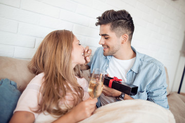 Poster - Man gives his woman yummy chocolate.