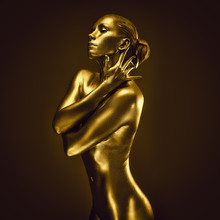 Golden Lady On Dark Background