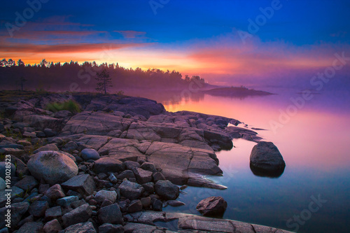 Rocks in the fog. Coast of ...