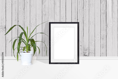 Download Photo Frame Mockup And Yucca Plant In Flower Pot Near Wooden Wall Buy This Stock Photo And Explore Similar Images At Adobe Stock Adobe Stock PSD Mockup Templates