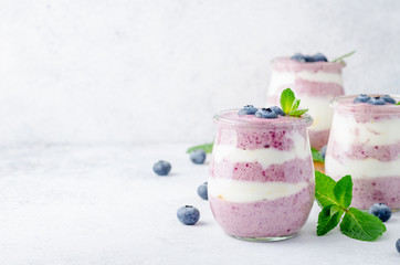 Wall Mural - Acai berry yogurt in glass jars