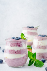 Wall Mural - Acai berry yogurt in glass jars