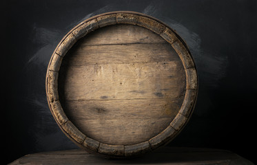 background of barrel and worn old table of wood