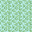 Seamless pattern with green fresh leaves on yblue background