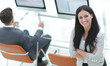 © ASDF - successful business woman on the background of a modern workplace