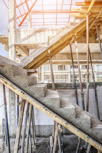 New House Construction With Concrete Staircase At Building Site New House Construction With Concrete Staircase At Building Site