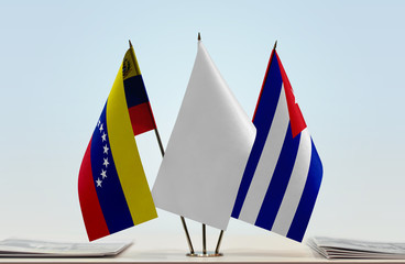 Flags of Venezuela and Cuba with a white flag in the middle