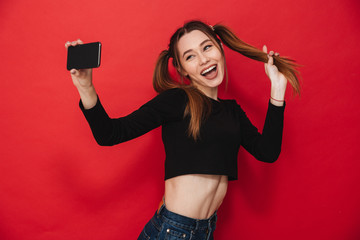 Wall Mural - Young cute lady standing isolated