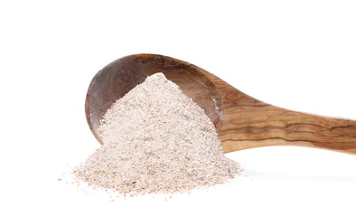 Pile of integral rye flour in wooden spoon isolated on white background