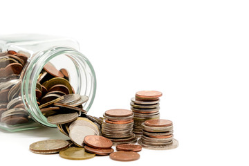 Coins in glass jar and outside, Thai currency money on white background