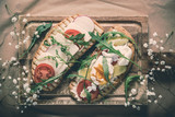 Fototapeta Boho - Double toast with egg, aragula, tomato and cheese,French toast bread with veggies,Spring healthy toast
