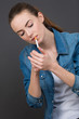 Young lady lighting cigarette