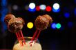 © dobryachok839 - dessert cookies on a stick on a bokeh background