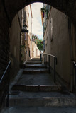 Fototapeta Przestrzenne - Dark mediterranean staircase, alley in Antibes, Cote d'Azur