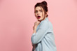 © master1305 - Portrait of the scared woman on pink