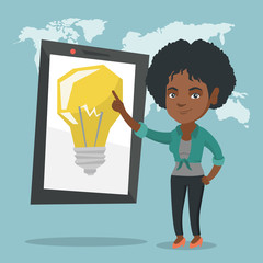 Poster - African woman pointing at a big tablet computer with a light bulb on a screen. Woman standing next to the tablet computer on the background of world map. Vector cartoon illustration. Square layout.