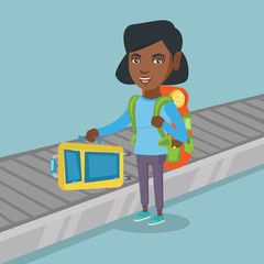 Poster - Happy african-american passenger picking up suitcase from luggage conveyor belt at the airport. Young cheerful passenger taking luggage from conveyor belt. Vector cartoon illustration. Square layout.