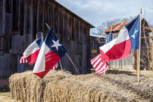 American And Texas Flags Arranged On Straw Bales, Independence Day Decoration