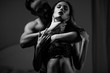 © Svyatoslav Lypynskyy - attractive belovers in underwear. Black and white close-up of a man and a woman. passion concept