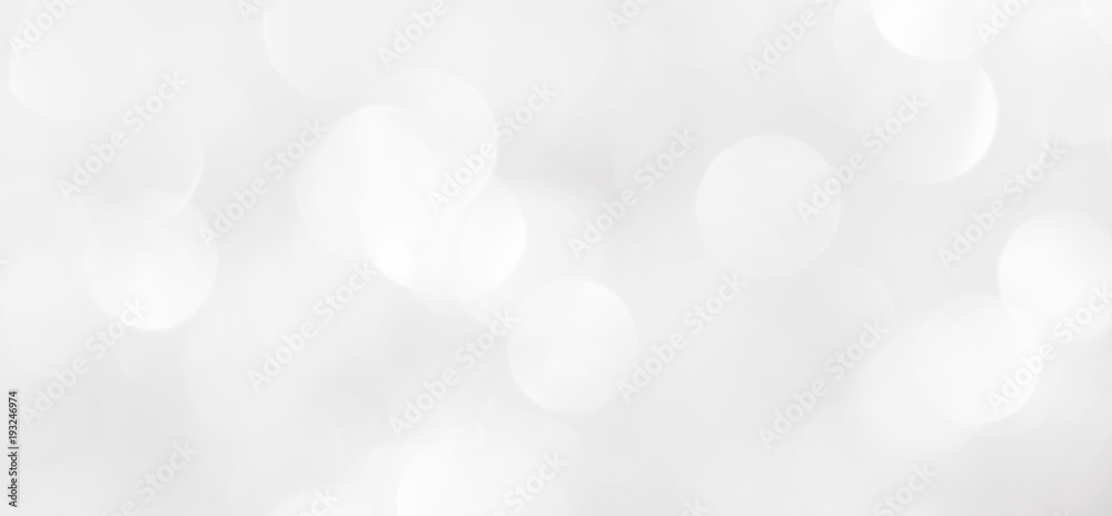A brilliant blurry white background for a festive mood. Template for greeting card for entertainment. - obrazy, fototapety, plakaty 