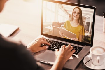 Poster - Composite image of female business executive using digital