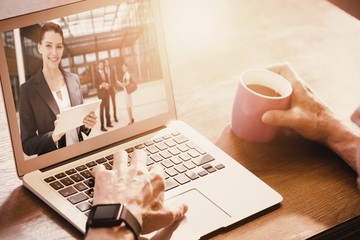Poster - Composite image of cropped image of man using laptop