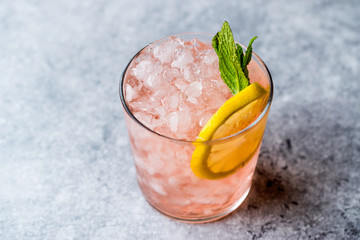 Wall Mural - Pink Cocktail with Crushed Ice, Mint and Lemon