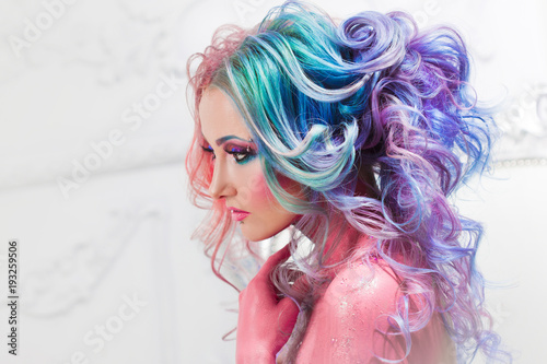 beautiful-woman-with-bright-hair-bright-hair-color-hairstyle-with-curls