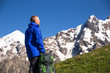 © lkoimages - Happy hiker relax on beautiful mountains landscape