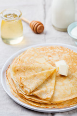 Wall Mural - Thin crepes or pancakes with butter and sour cream