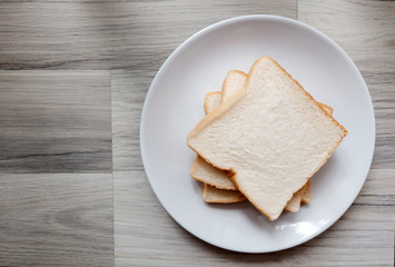 Toasted 3 slice of bread on white plate