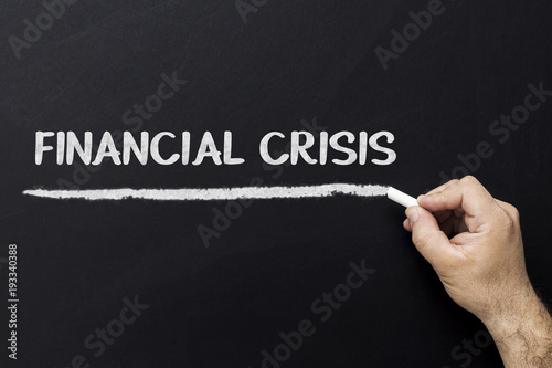 Fotografía Hand writing Financial crisis on a chalkboard