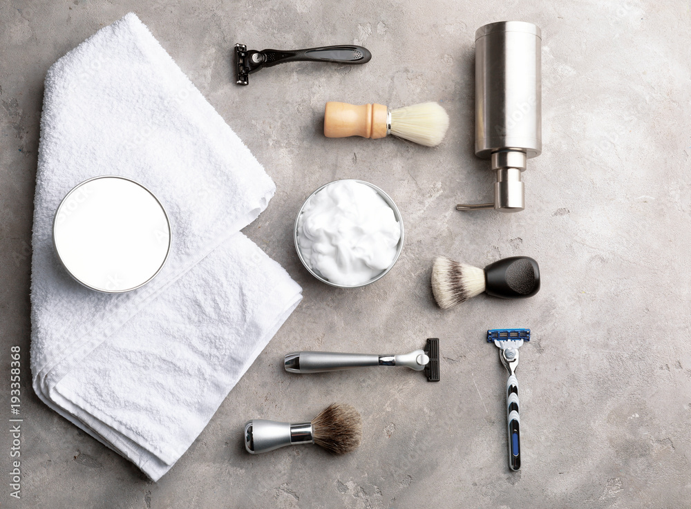 Shaving accessories for man on grey background