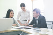© Suntipong - Successful business people achieving goals, Happy business team celebrating success, Group of business team. Business team sharing their ideas. Selective focus