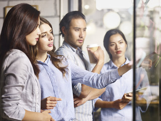 Wall Mural - Team of entrepreneurs meeting in an office