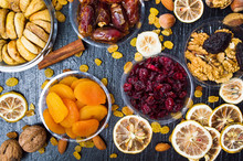 Various Dried Fruits In Small Bowls Top View