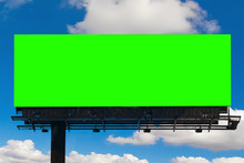 Empty Billboard With Chroma Key Green Screen, On Blue Sky With Clouds, Advertisement Concept