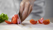 © motortion - Housewife accidentally cutting her finger by knife in kitchen, home traumatism