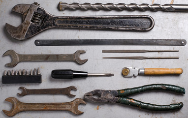 Set of hand old tools on grey background