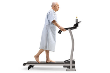 Wall Mural - Elderly patient walking on a treadmill