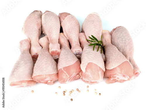 Dizaine De Pilons De Poulet Crus Sur Fond Blanc Buy This Stock