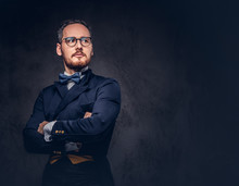 Portrait Of A Bearded Male In Glasses And Antique Suit On A Dark