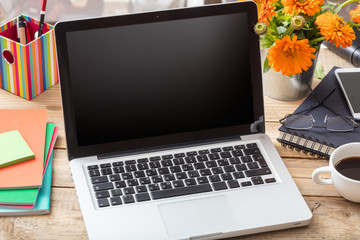 Wall Mural - Black computer screen on an office desk, copy space