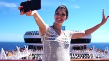 Woman Taking A Selfie On Cruise Ship