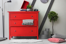 Cozy Wardrobe Room Interior With Red Chest Of Drawers