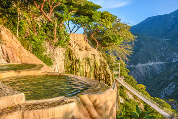 Wall Mural - Sunrise at Tolantongo thermal baths in Hidalgo, Mexico