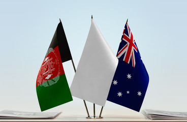 Flags of Afghanistan and Australia with a white flag in the middle